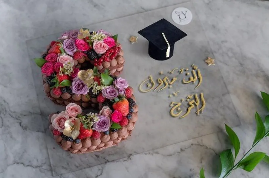 GARDEN LETTERS GRADUATION CAKE