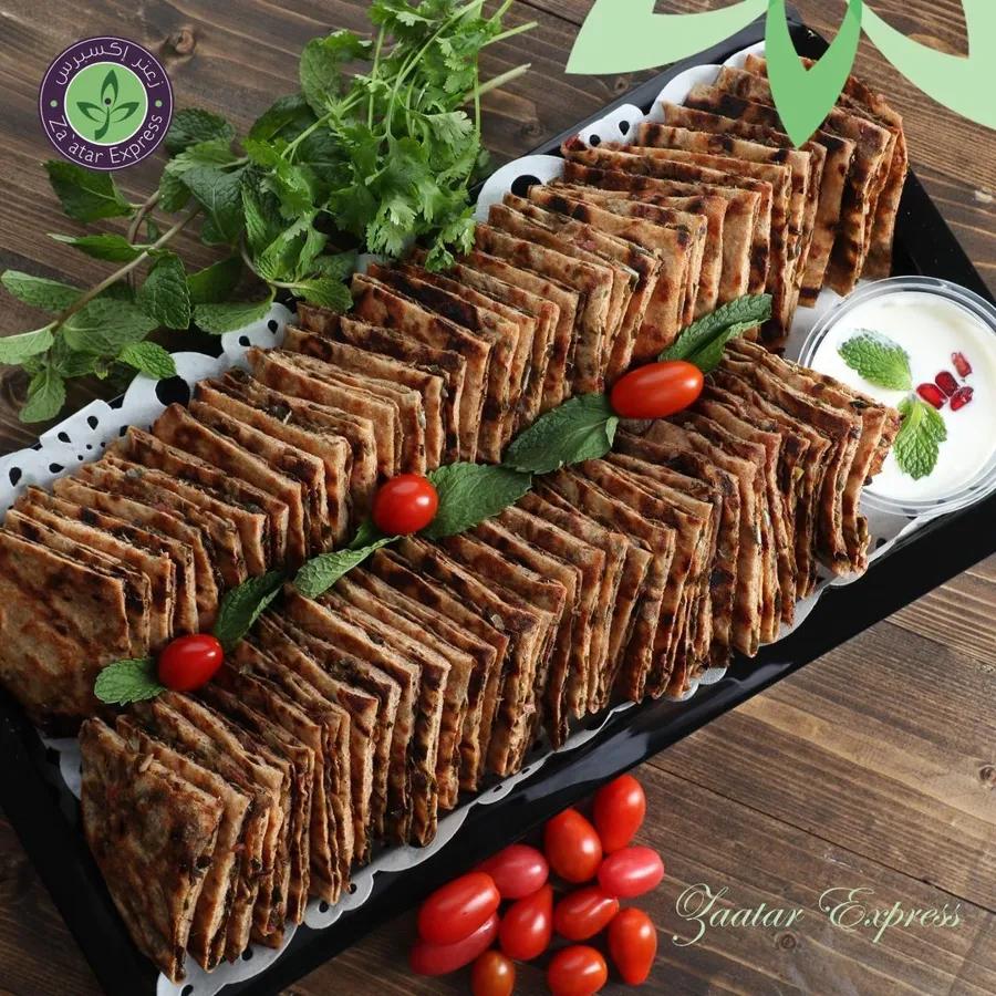 Signature whole-wheat zaatar and green salaa