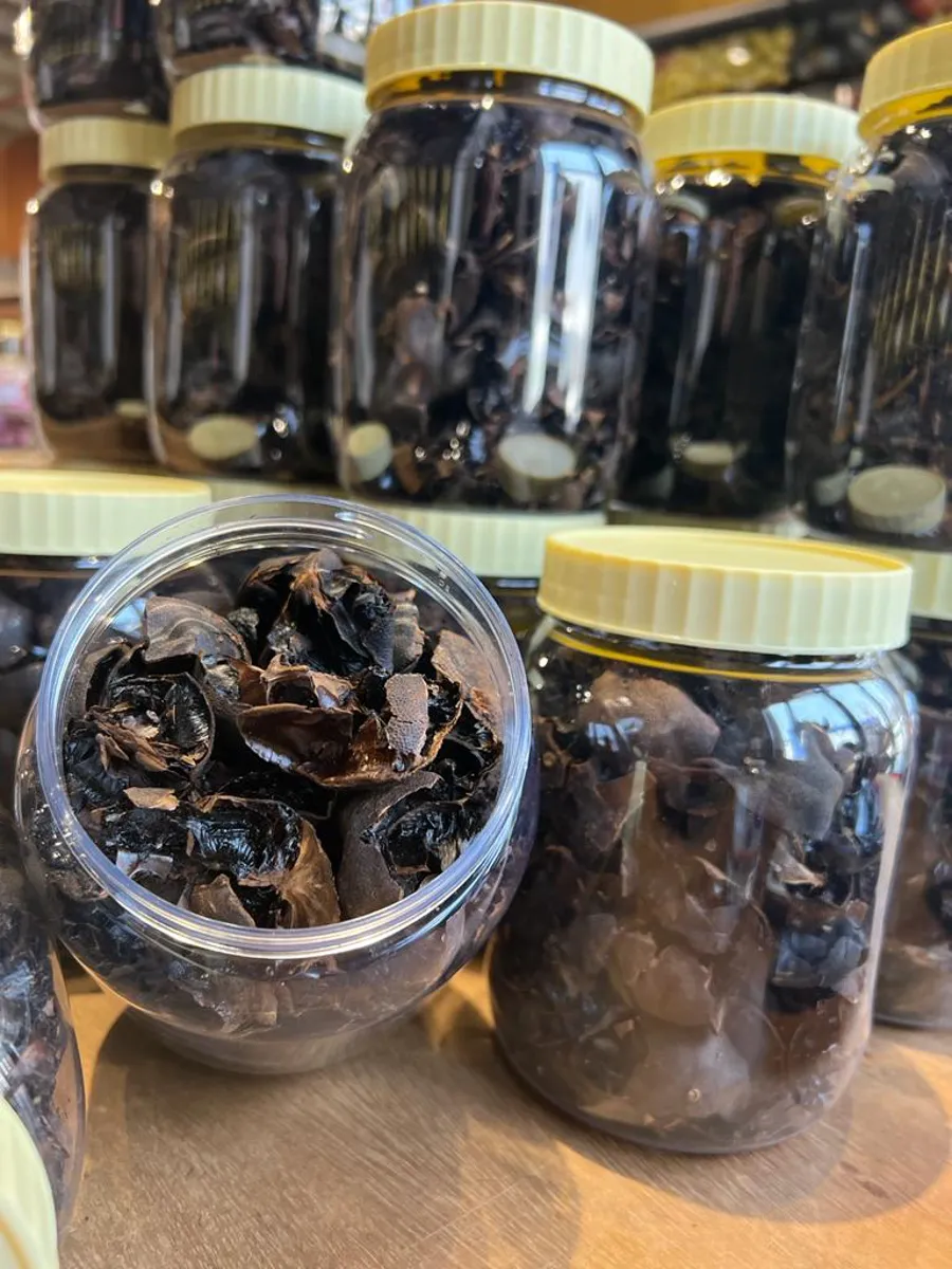 Black lome plum, seeded and crushed