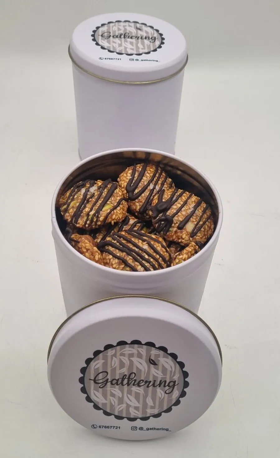 Sesame sweets in a medium metal box