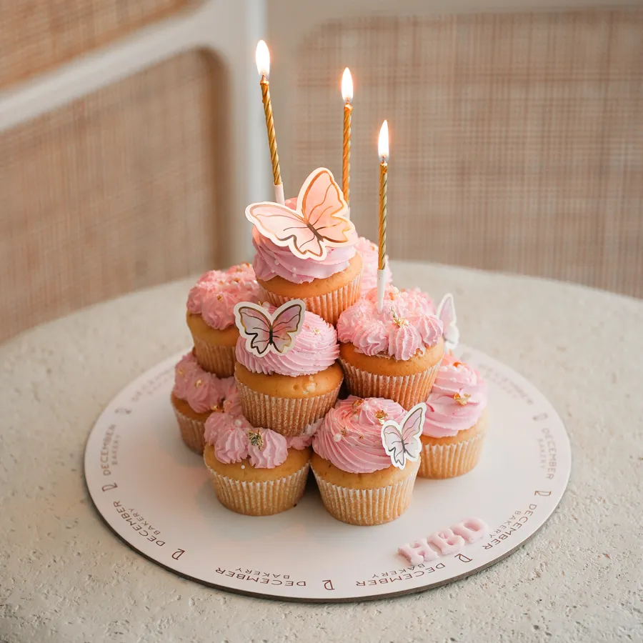 Pink cup cake tower butterfly