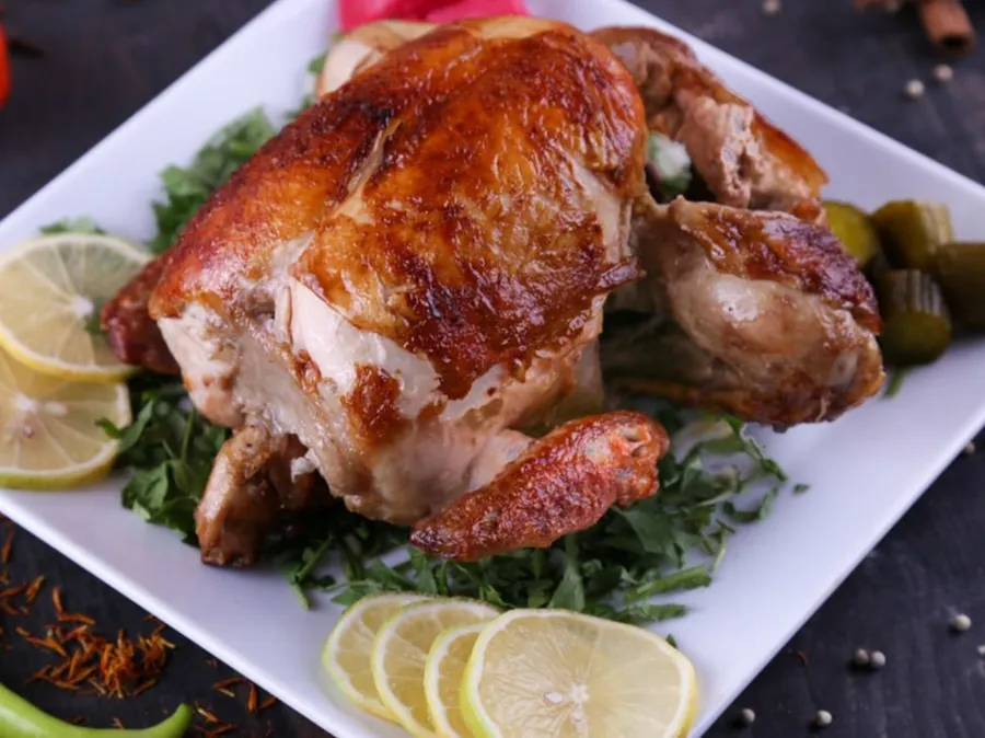 Half a chicken grilled on gas without the need