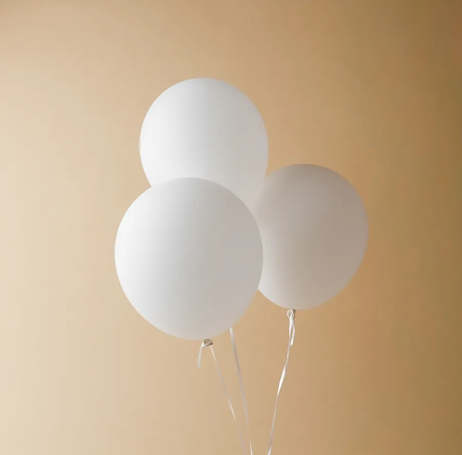 3 white balloons