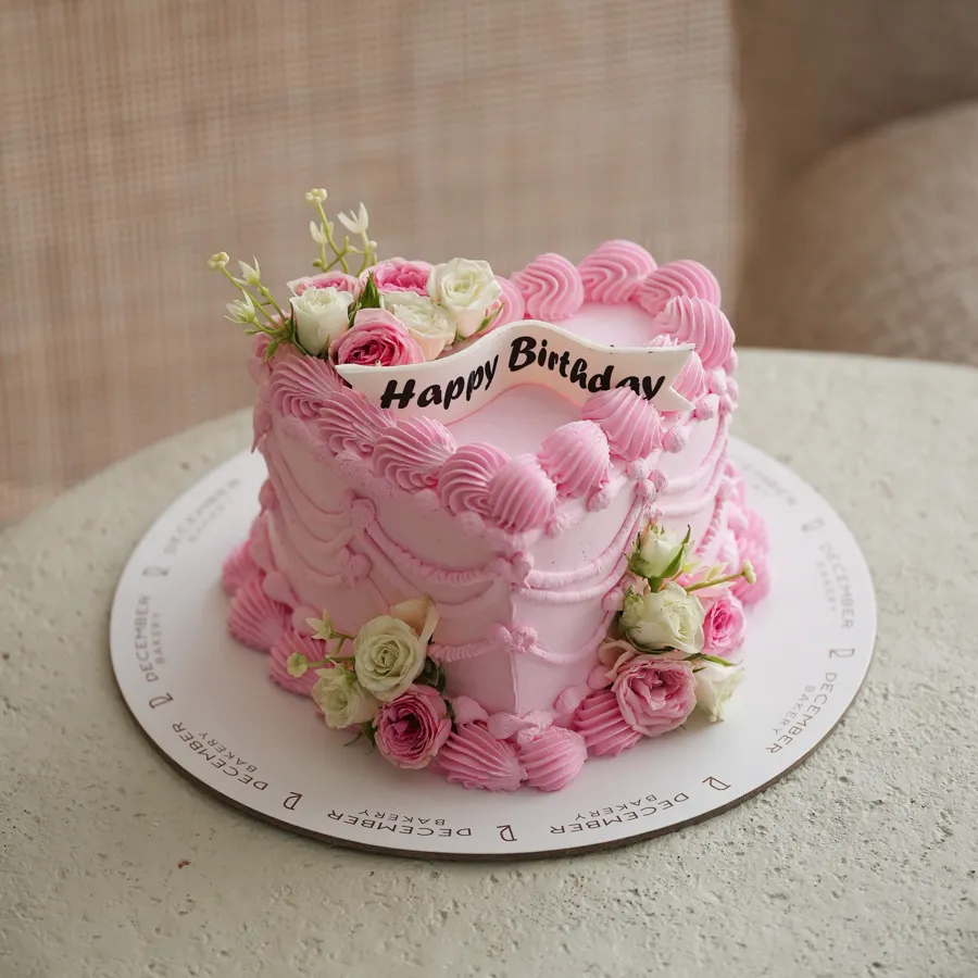 Pink hearts cake with flower