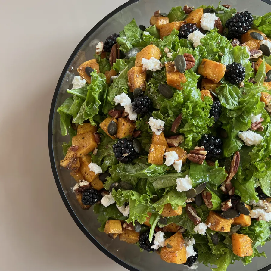 kale butternut squash salad with blackberries and roasted pecans