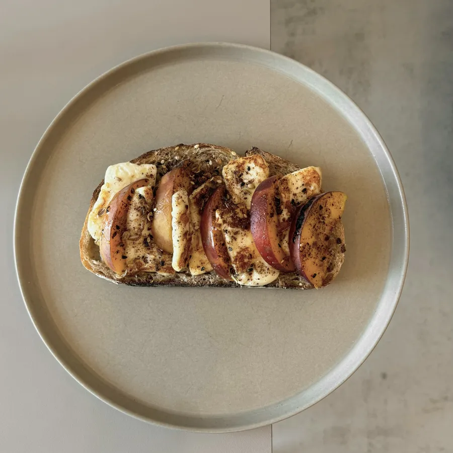 bruleed peach, halloum and dukkah tartine