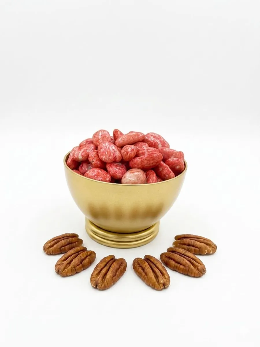 Dragee coated with strawberry chocolate