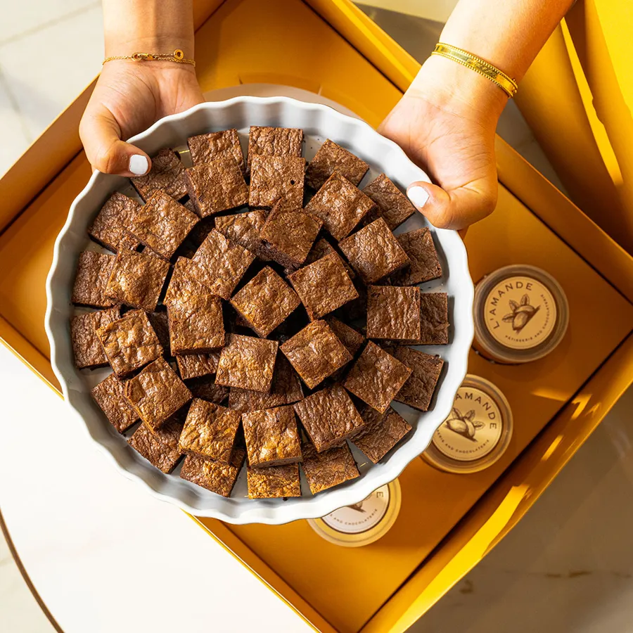 brownie bites with chocolate and caramel sauces