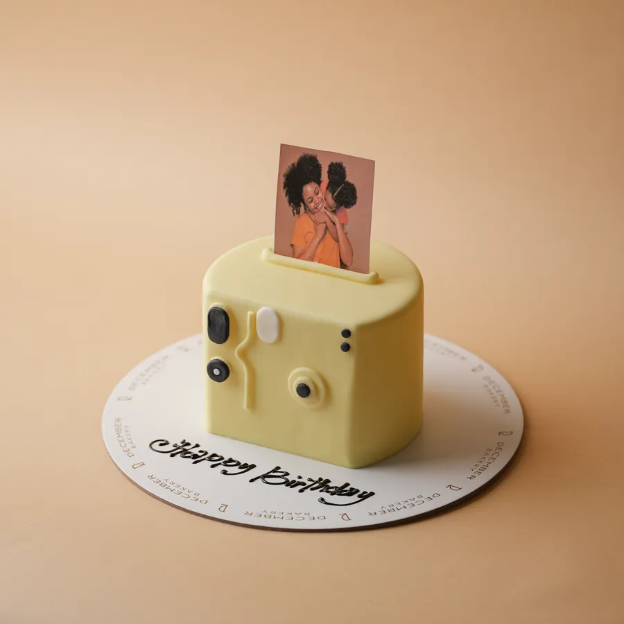 Camera yellow photo cake
