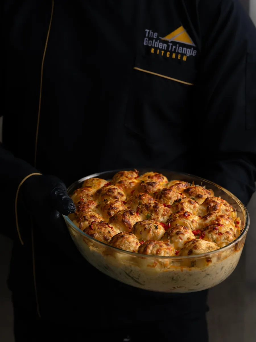 Potato balls with chicken and vegetables