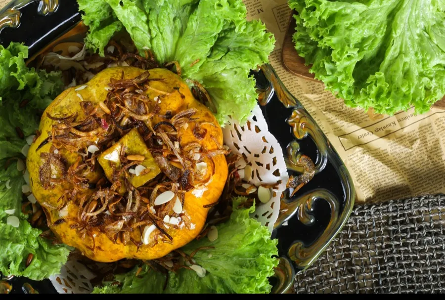Pumpkin stuffed with rice and meat